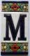 M - Fliese N° 1